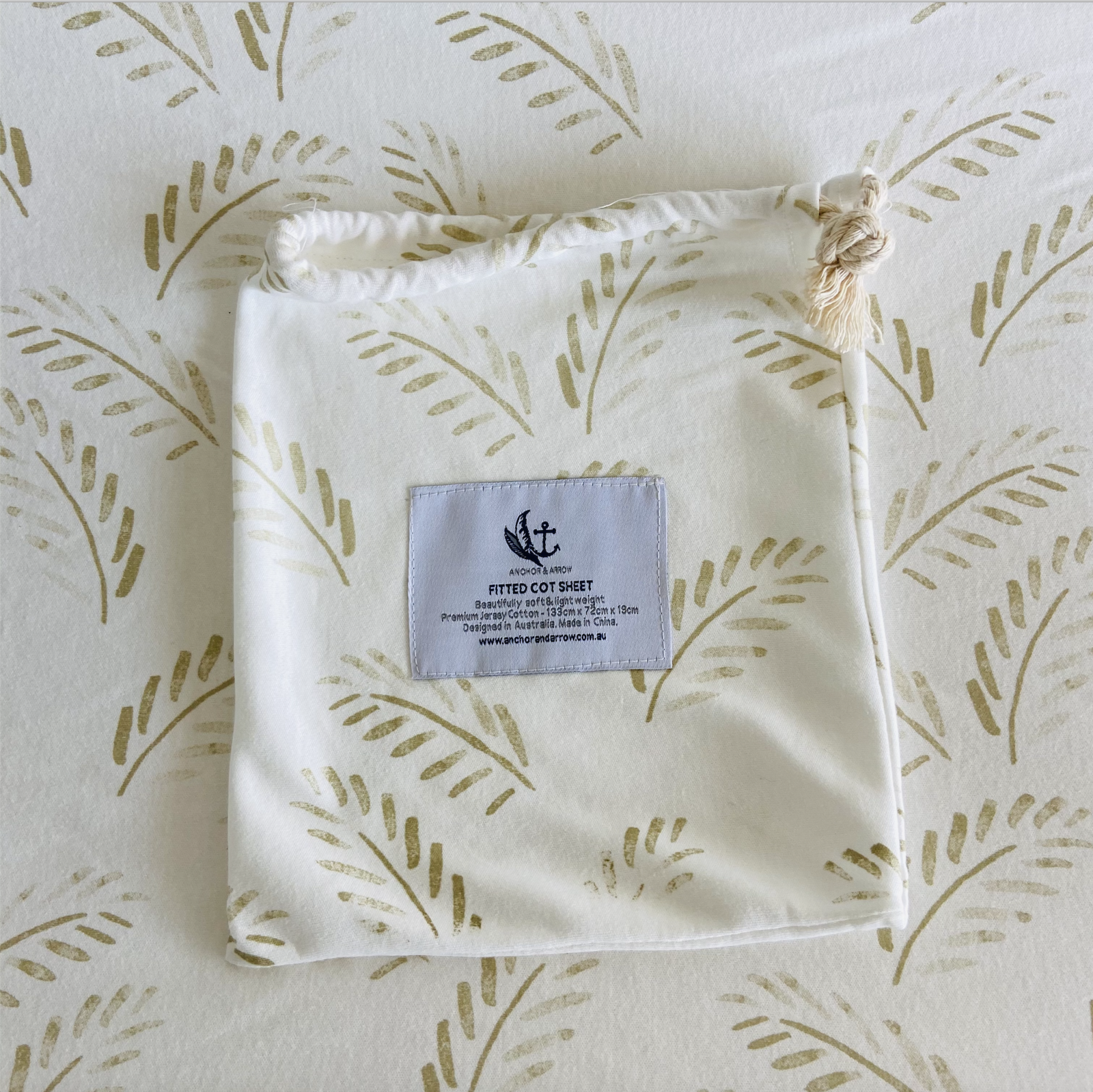 Jersey Cotton Cot Sheet -   Gold Fern