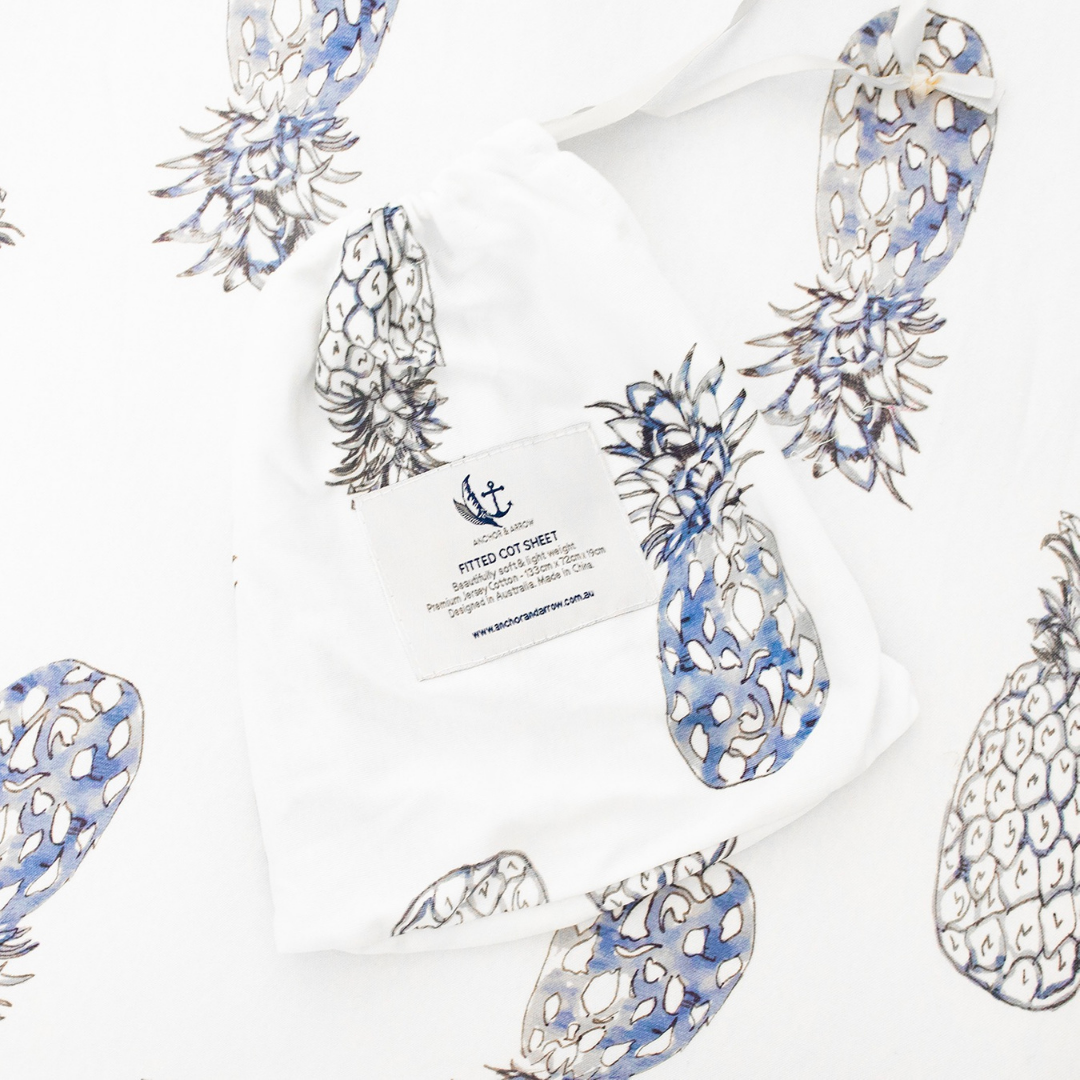 Jersey Cotton Cot Sheet - Indigo Pineapples
