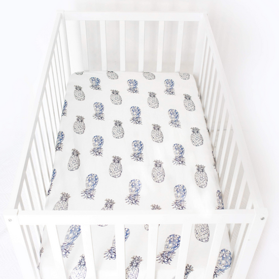 Jersey Cotton Cot Sheet - Indigo Pineapples