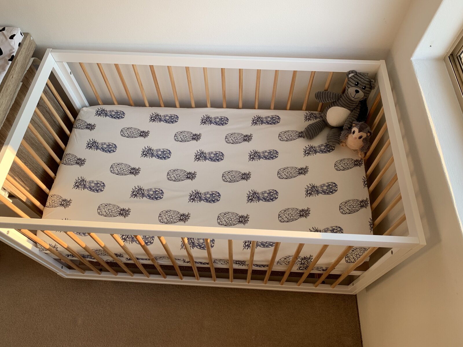 Jersey Cotton Cot Sheet - Indigo Pineapples